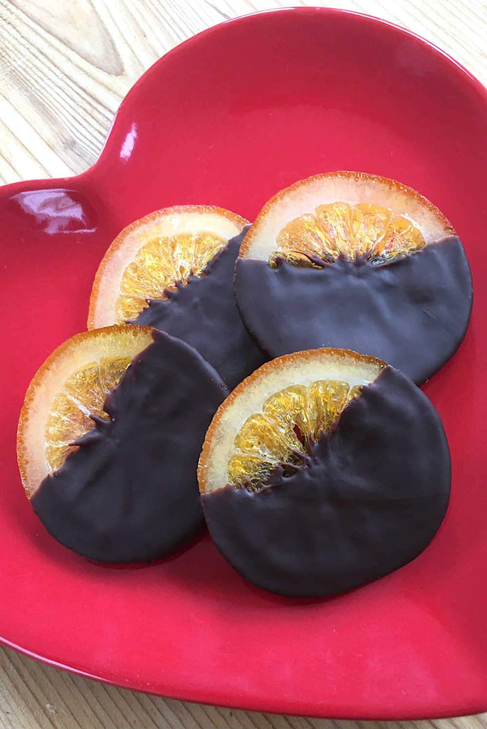 Whole orange slices covered / coated in Belgian dark chocolate