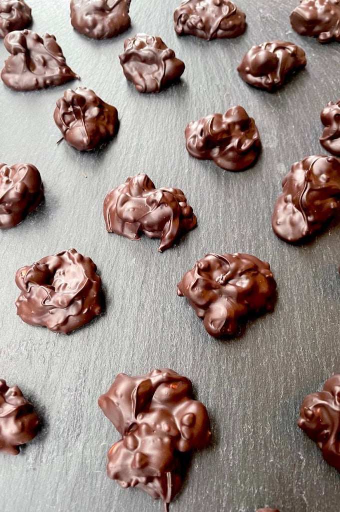 whole and chopped hazelnuts in Belgian 70% dark chocolate