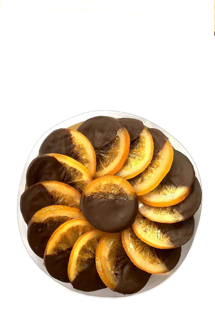 Whole candied orange slices coated in 70% dark Belgian chocolate