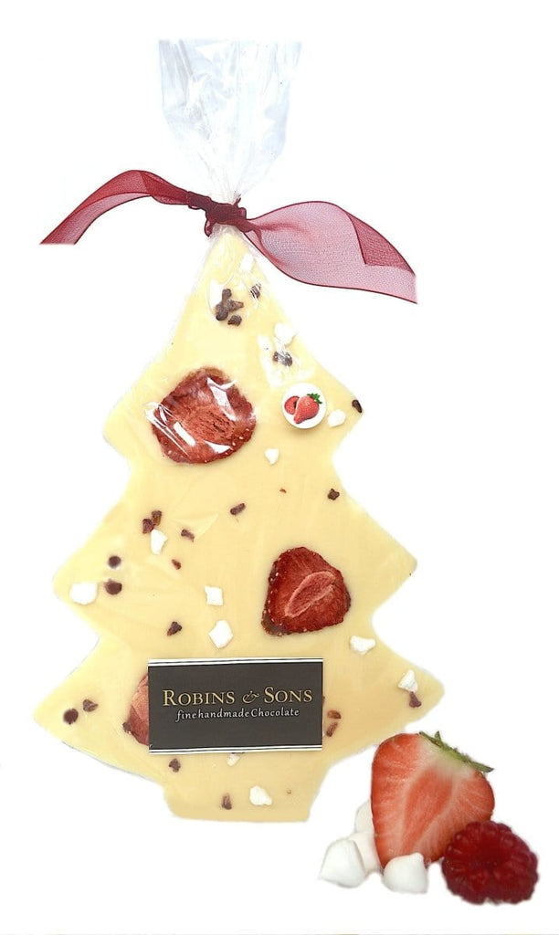 White chocolate Christmas tree bar with strawberries, raspberries and meringue