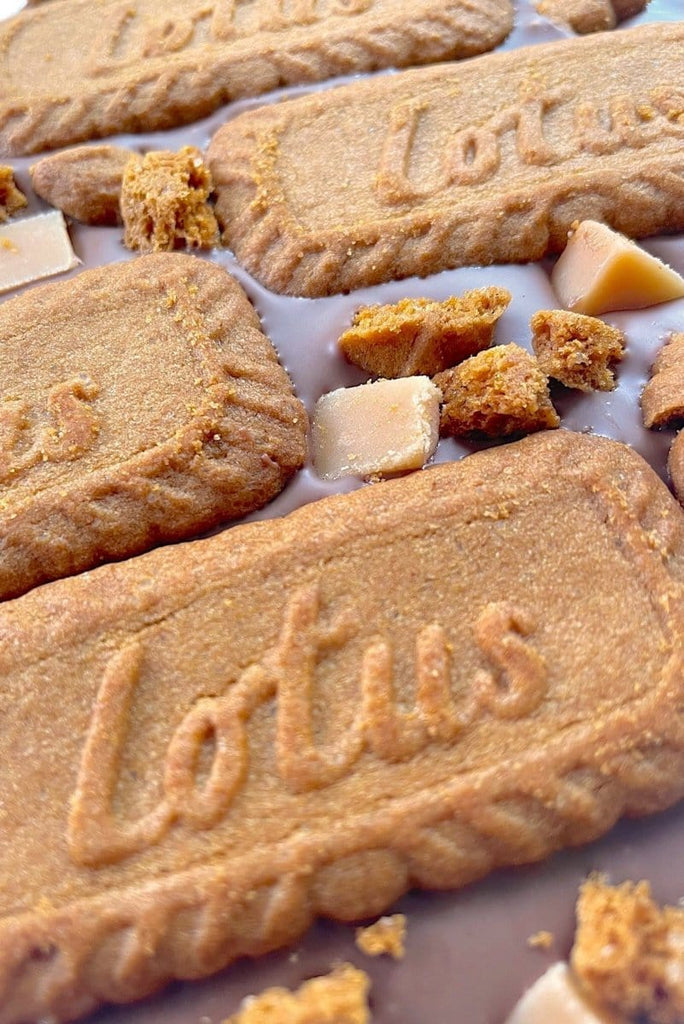 Milk Chocolate covered with lotus biscoff biscuits close up